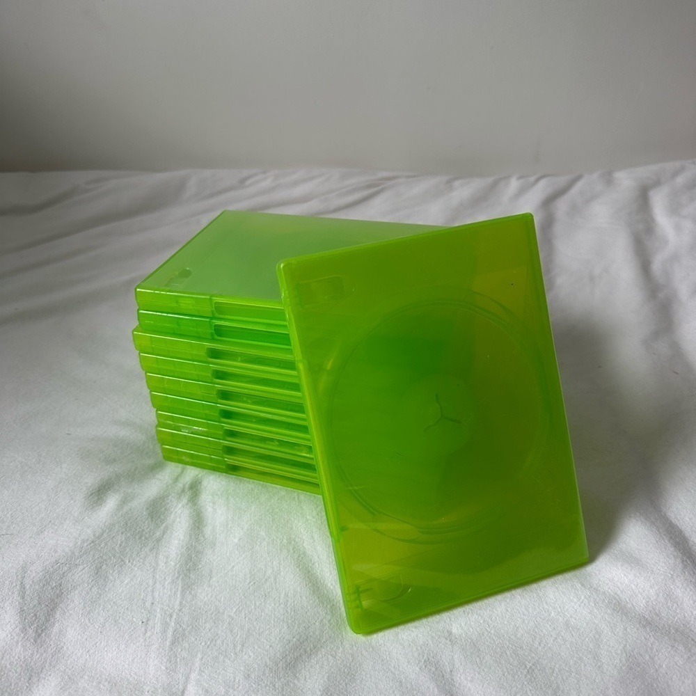 10 empty Xbox game cases